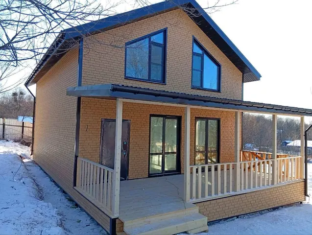 Двухэтажный каркасный дом 160 м² с крытой террасой 24 м²